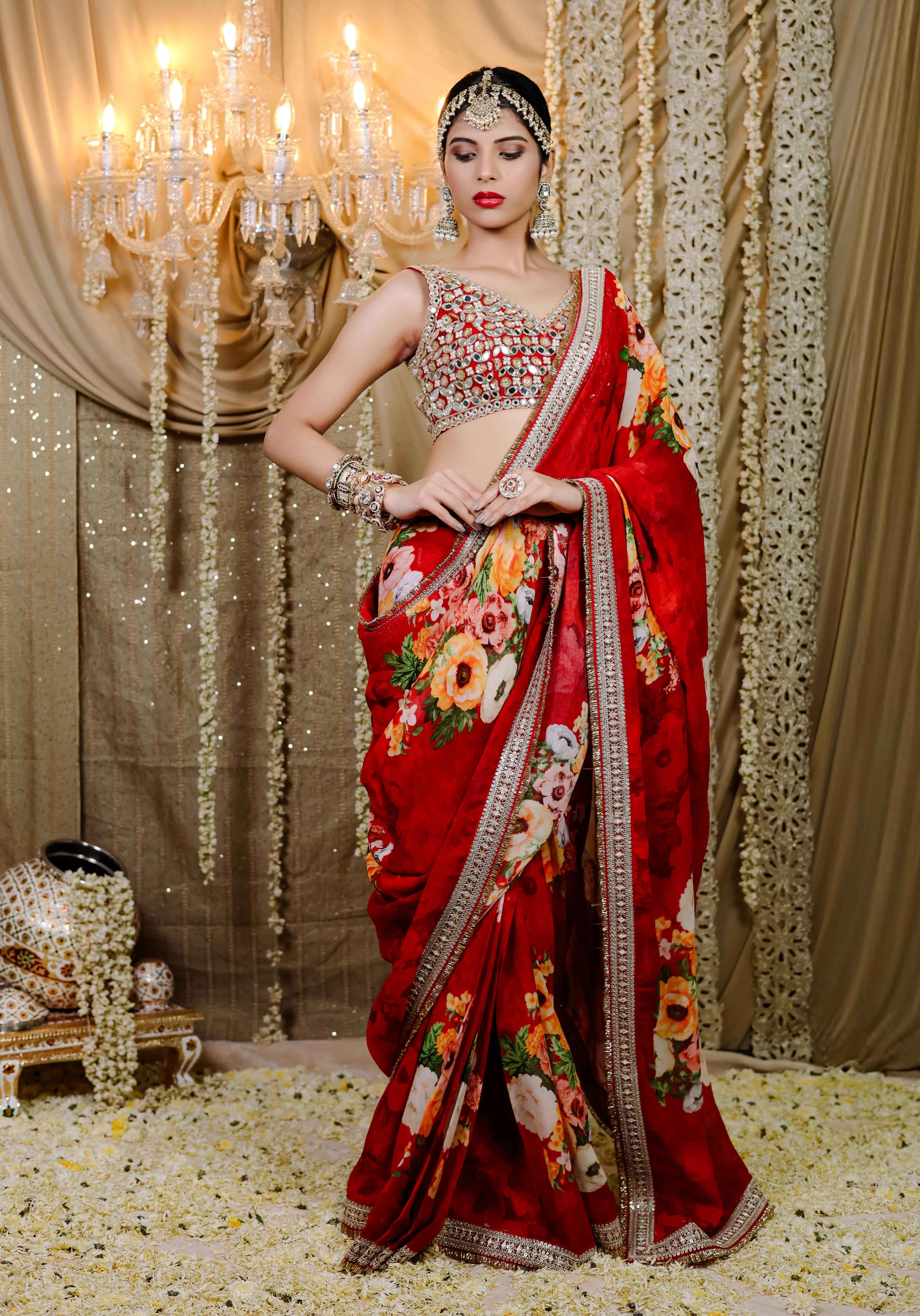 A model showcasing Red Floral Printed Predraped Saree Set Feature image by Foram Patel from Foram Patel's collection