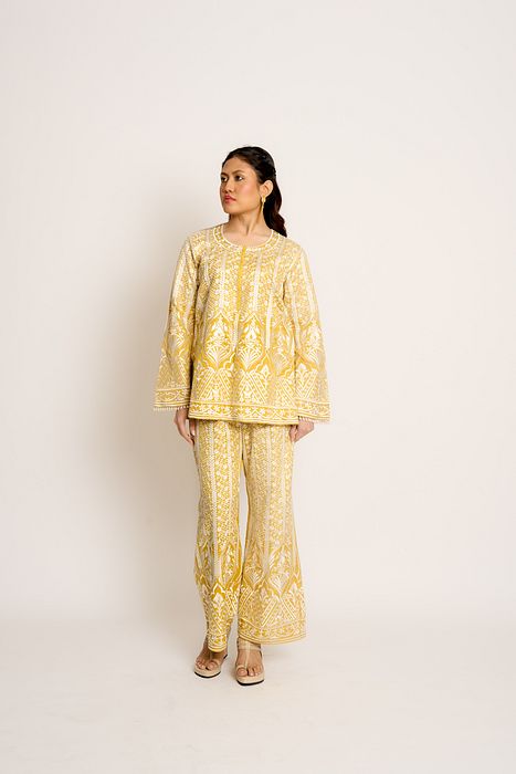 A model showcasing Daffodil Yellow Aisha Twin Set by Ashtar from Ashtar's collection