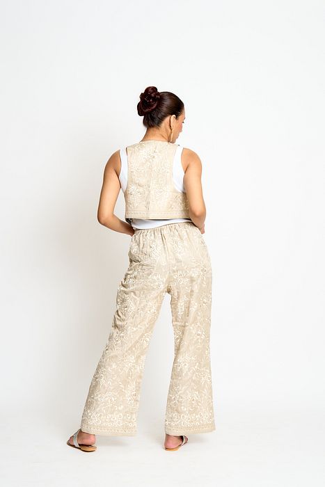 A model showcasing Beige And Black Kalki Reversible Waistcoat by Ashtar from Ashtar's collection
