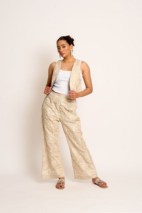 A model showcasing Beige And Black Kalki Reversible Waistcoat by Ashtar from Ashtar's collection