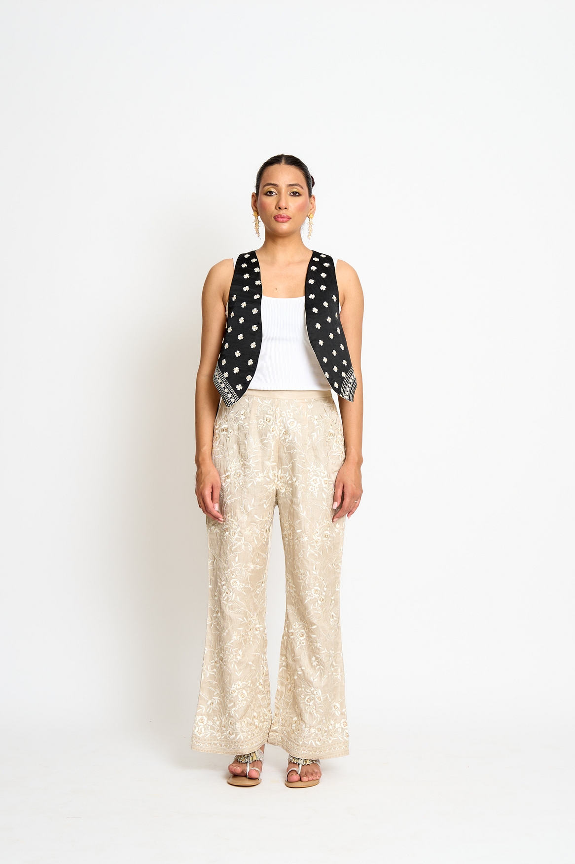 A model showcasing Beige And Black Kalki Reversible Waistcoat Feature image by Ashtar from Ashtar's collection