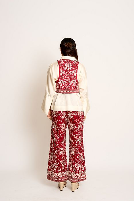 A model showcasing Red And Blue Kalki Reversible Waistcoat by Ashtar from Ashtar's collection