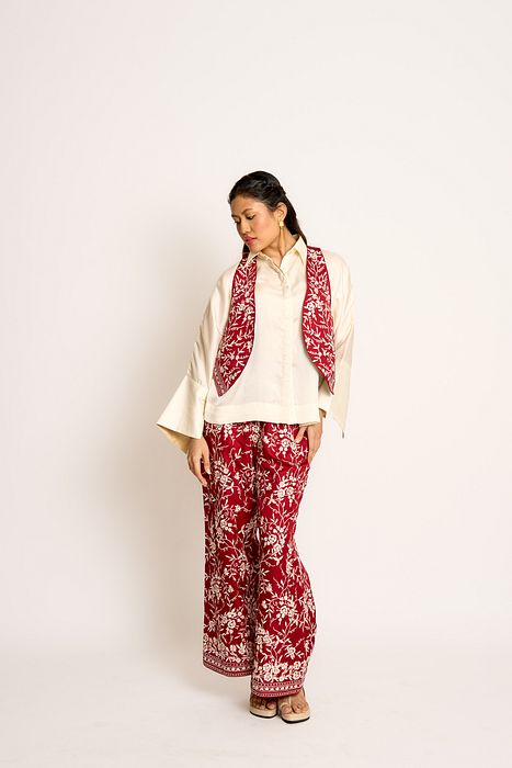 A model showcasing Red And Blue Kalki Reversible Waistcoat by Ashtar from Ashtar's collection