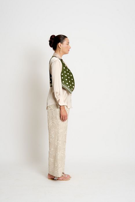 A model showcasing Khaki And Taupe Kalki Reversible Waistcoat by Ashtar from Ashtar's collection