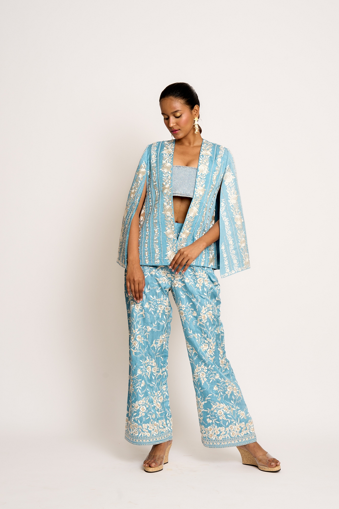 A model showcasing Teapot Blue Giro Cape And Pants Set Feature image by Ashtar from Ashtar's collection