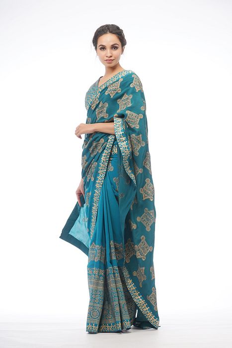 A model showcasing Dual Tone Silk Saree by Shruti S Label from Shruti S Label's collection