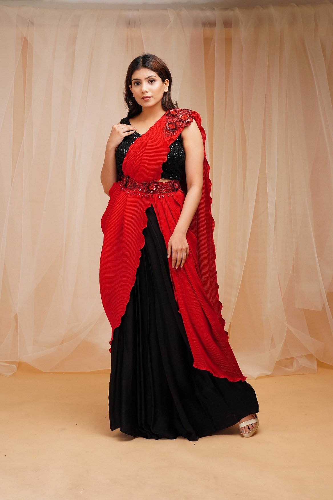 A model showcasing Candy Red Jet Black Ready To Wear Drape Saree Feature image by Farha Syed from Farha Syed's collection