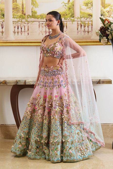 A model showcasing Azura Lehenga Set by Moledro from Moledro's collection
