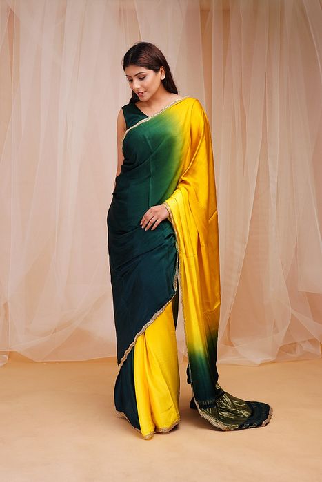 A model showcasing Green And Yellow 4D Dyed Saree by Farha Syed from Farha Syed's collection A model showcasing Green And Yellow 4D Dyed Saree by Farha Syed from Farha Syed's collection