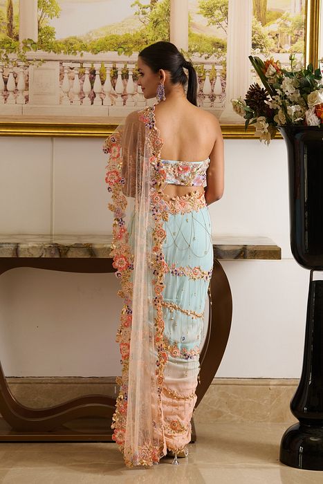 A model showcasing Rian Saree by Moledro from Moledro's collection
