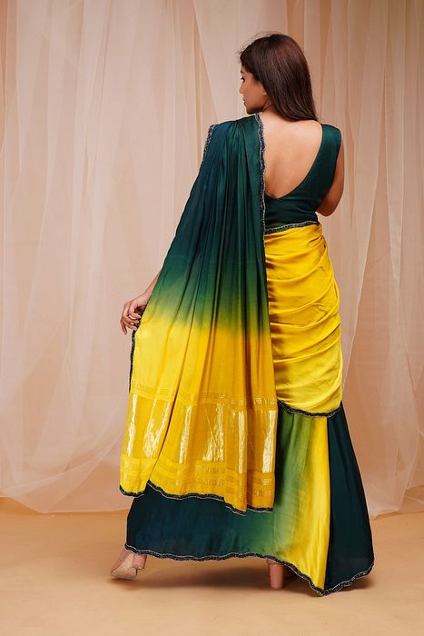 A model showcasing 4d Dyed Ready To Wear Drape Saree by Farha Syed from Farha Syed's collection A model showcasing 4d Dyed Ready To Wear Drape Saree by Farha Syed from Farha Syed's collection