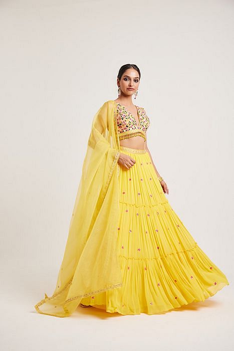 A model showcasing Hanika Lehenga by Muditaa By Urmila from Muditaa By Urmila's collection