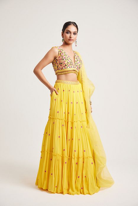 A model showcasing Hanika Lehenga by Muditaa By Urmila from Muditaa By Urmila's collection