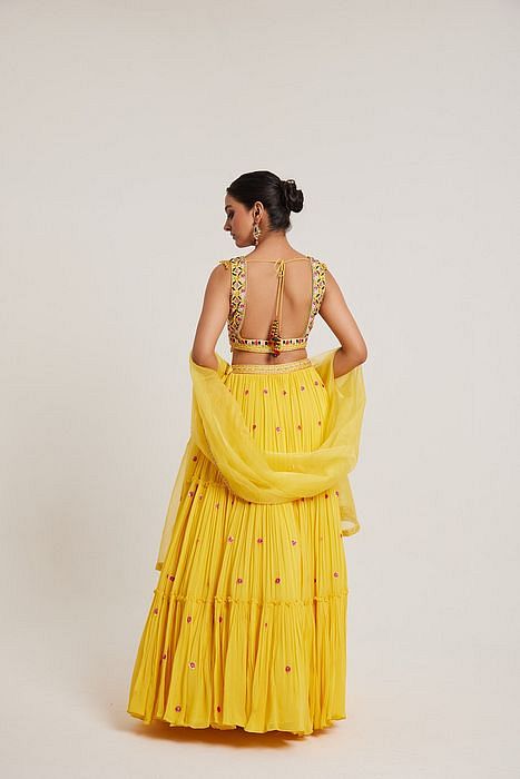 A model showcasing Hanika Lehenga by Muditaa By Urmila from Muditaa By Urmila's collection