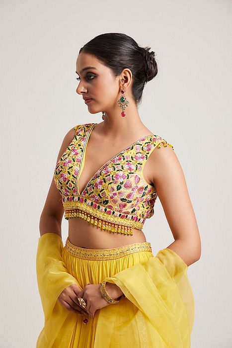 A model showcasing Hanika Lehenga by Muditaa By Urmila from Muditaa By Urmila's collection