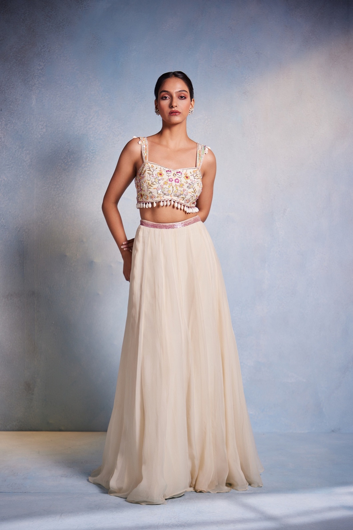 A model showcasing Shankha Lehenga Feature image by Muditaa By Urmila from Muditaa By Urmila's collection