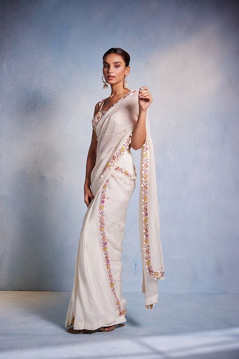 A model showcasing Shankha Saree by Muditaa By Urmila from Muditaa By Urmila's collection