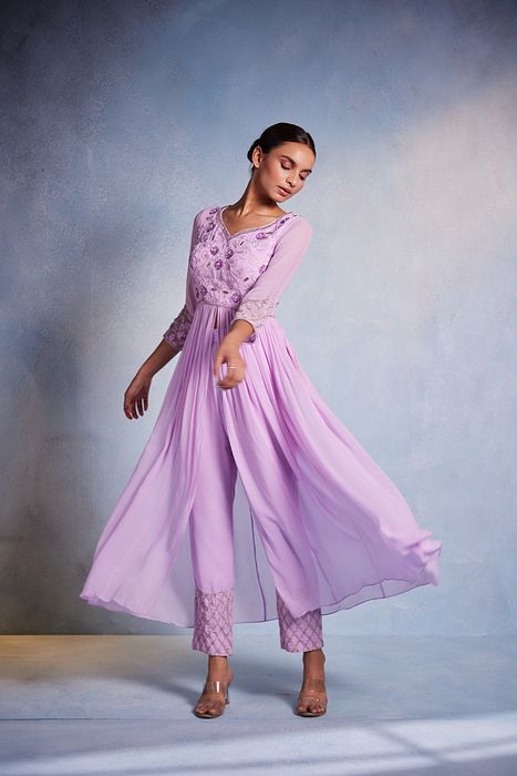 A model showcasing Kiyah Suit Set by Muditaa By Urmila from Muditaa By Urmila's collection
