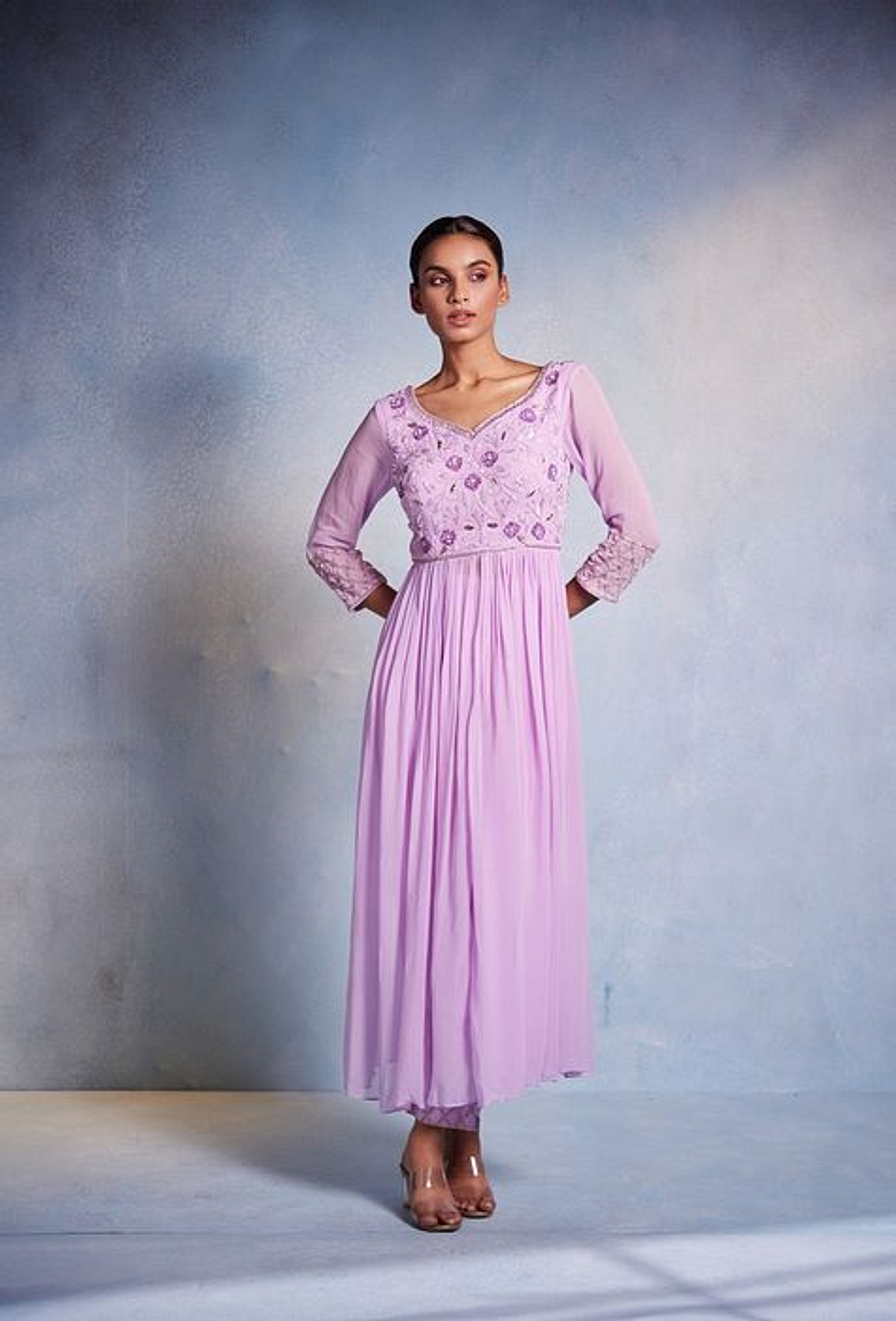 A model showcasing Kiyah Suit Set Feature image by Muditaa By Urmila from Muditaa By Urmila's collection