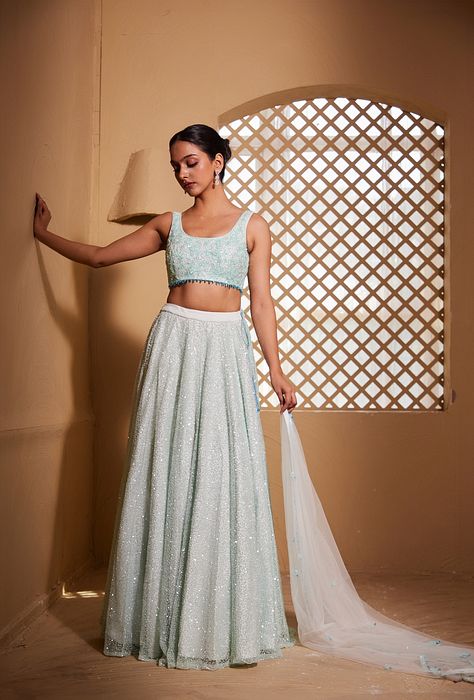 A model showcasing Gahina Lehenga by Muditaa By Urmila from Muditaa By Urmila's collection