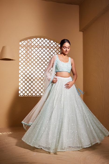 A model showcasing Gahina Lehenga by Muditaa By Urmila from Muditaa By Urmila's collection