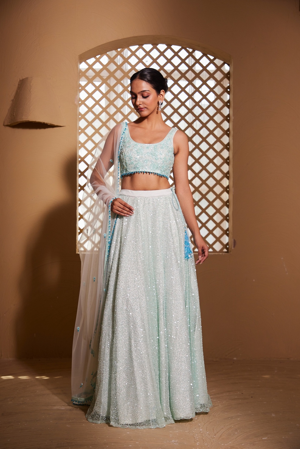 A model showcasing Gahina Lehenga Feature image by Muditaa By Urmila from Muditaa By Urmila's collection