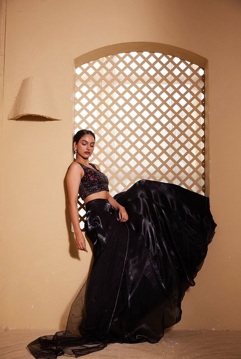 A model showcasing Qainaat Lehenga by Muditaa By Urmila from Muditaa By Urmila's collection