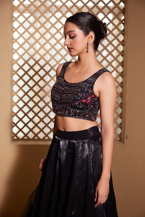 A model showcasing Qainaat Lehenga by Muditaa By Urmila from Muditaa By Urmila's collection