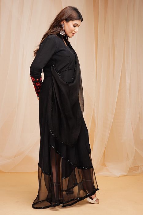 A model showcasing Jet Black Organza Drape Dress by Farha Syed from Farha Syed's collection