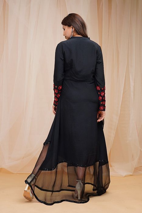 A model showcasing Jet Black Organza Drape Dress by Farha Syed from Farha Syed's collection A model showcasing Jet Black Organza Drape Dress by Farha Syed from Farha Syed's collection