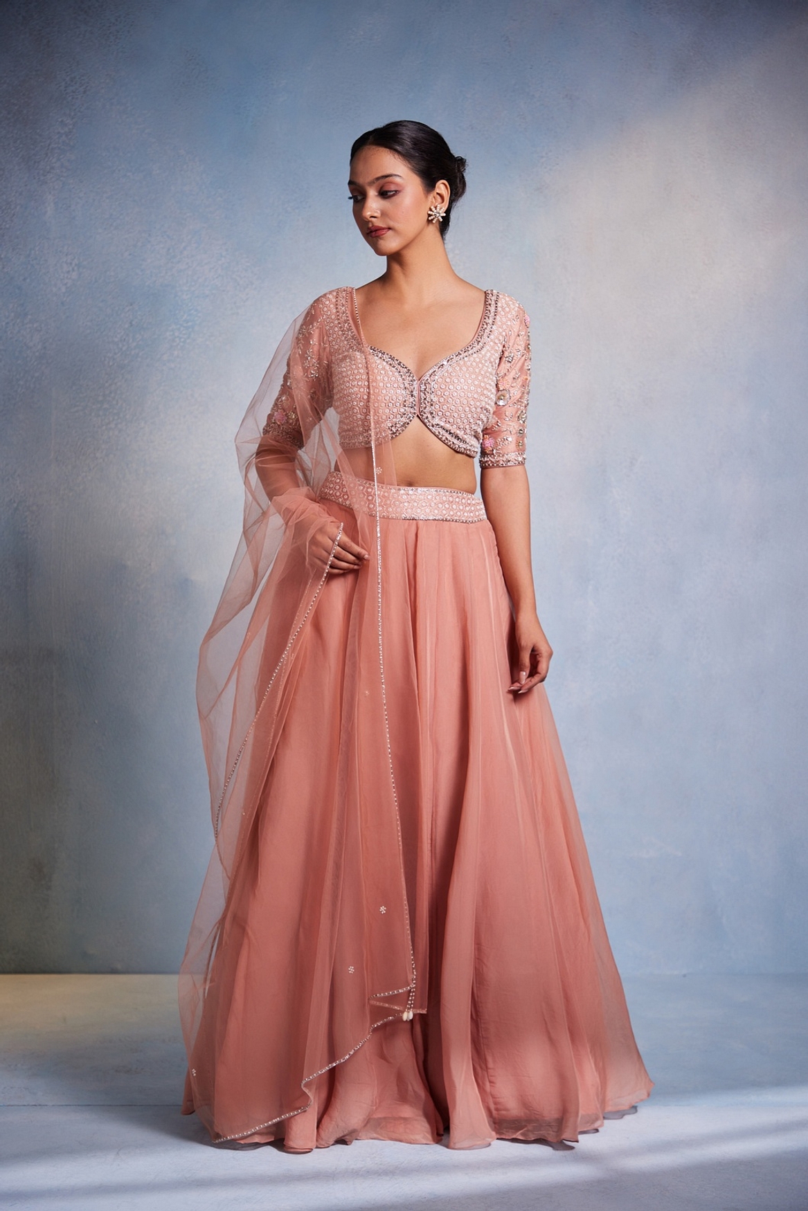 A model showcasing Elakshi Blouse Lehenga Set Feature image by Muditaa By Urmila from Muditaa By Urmila's collection