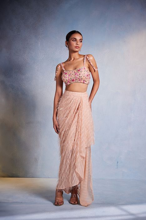 A model showcasing Poorna Dhoti Set by Muditaa By Urmila from Muditaa By Urmila's collection