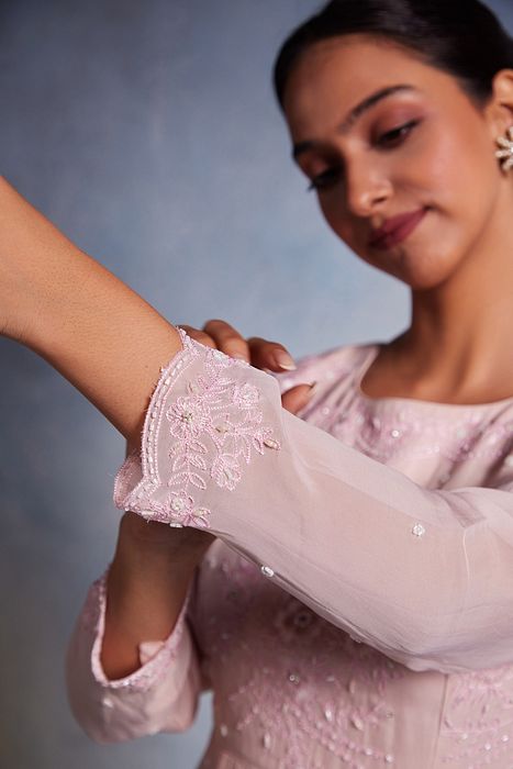 A model showcasing Aamani Dress by Muditaa By Urmila from Muditaa By Urmila's collection