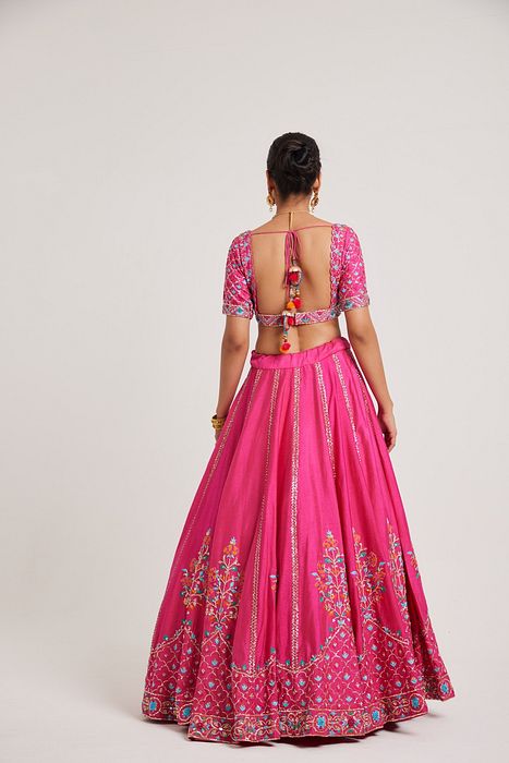 A model showcasing Bhargvi Lehenga by Muditaa By Urmila from Muditaa By Urmila's collection