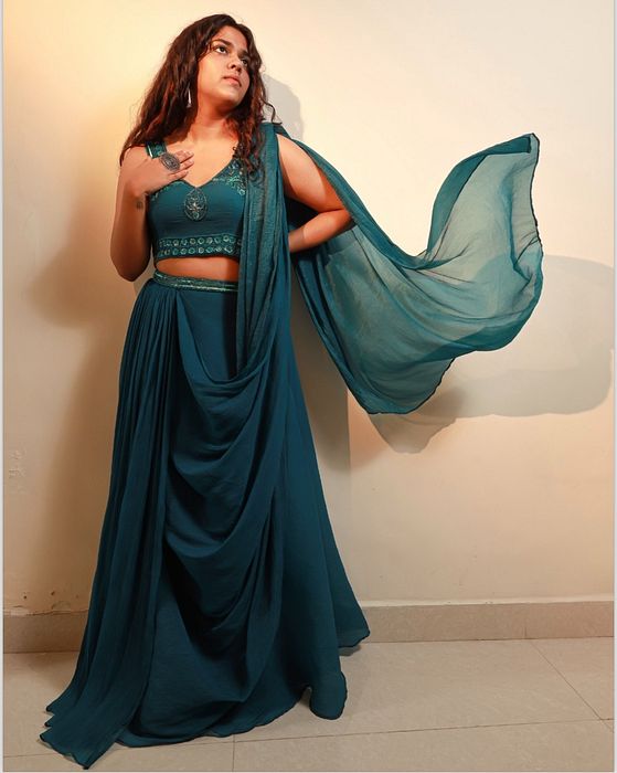 A model showcasing Raine Saree by Muditaa By Urmila from Muditaa By Urmila's collection