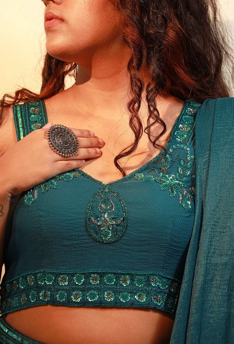 A model showcasing Raine Saree by Muditaa By Urmila from Muditaa By Urmila's collection