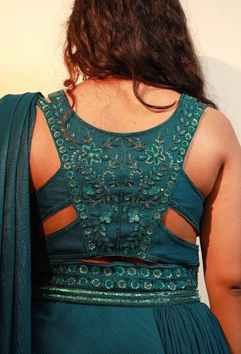 A model showcasing Raine Saree by Muditaa By Urmila from Muditaa By Urmila's collection