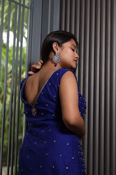 A model showcasing Akasa Gharara Set by Muditaa By Urmila from Muditaa By Urmila's collection