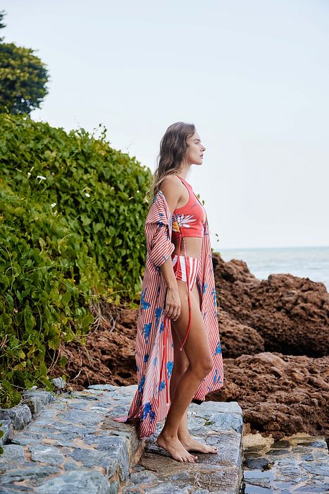 A model showcasing Songbird Bikini With Cape by Nautanky from Nautanky's collection