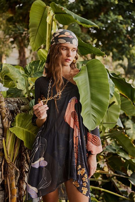 A model showcasing Ebony Bikini With Short Kaftan by Nautanky from Nautanky's collection