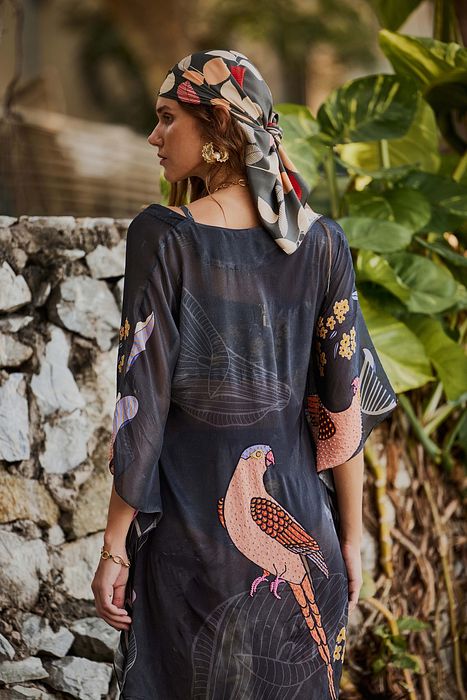 A model showcasing Ebony Bikini With Short Kaftan by Nautanky from Nautanky's collection