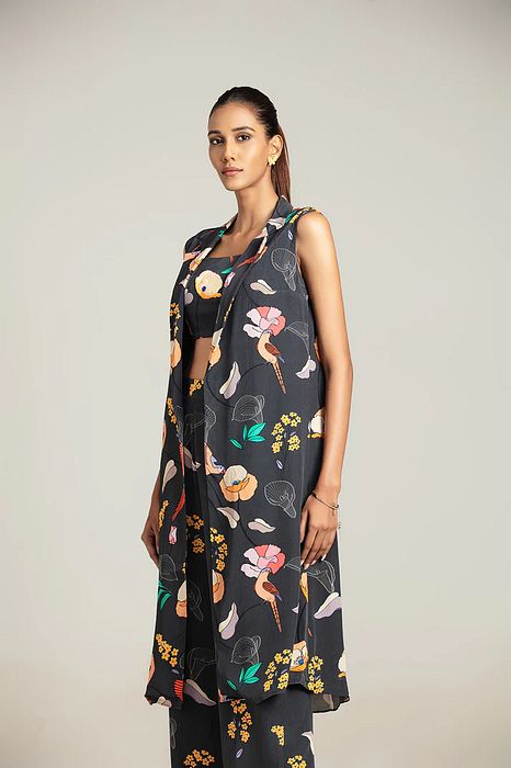 A model showcasing Eden Trench With Crop Top And Pants by Nautanky from Nautanky's collection