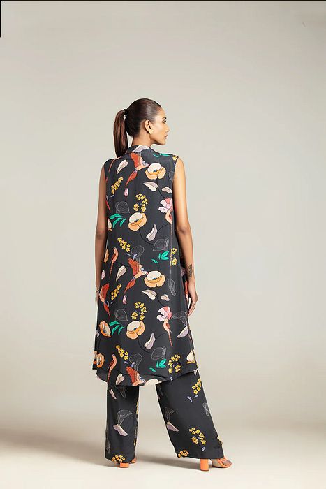 A model showcasing Eden Trench With Crop Top And Pants by Nautanky from Nautanky's collection