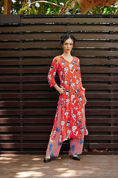 A model showcasing Paradise Kurta With Pants by Nautanky from Nautanky's collection