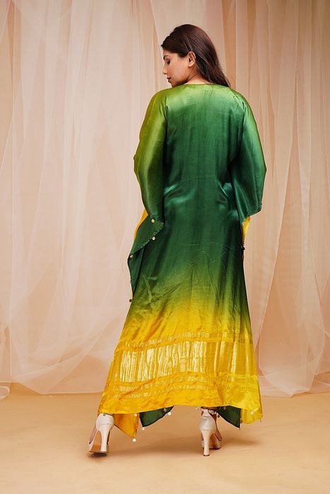 A model showcasing Bright Yellow Golf Green Shaded Kaftaan by Farha Syed from Farha Syed's collection A model showcasing Bright Yellow Golf Green Shaded Kaftaan by Farha Syed from Farha Syed's collection