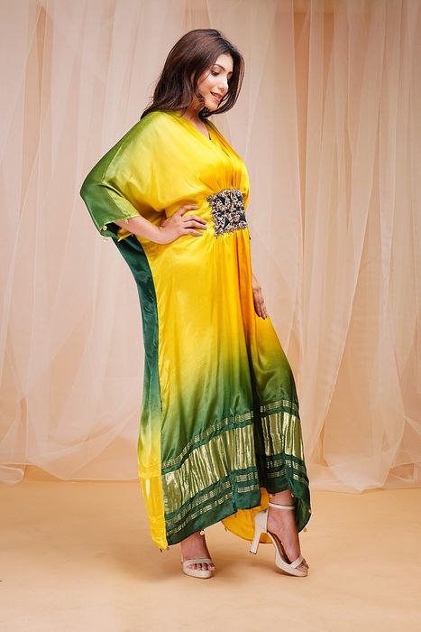 A model showcasing Bright Yellow Golf Green Kaftaan by Farha Syed from Farha Syed's collection A model showcasing Bright Yellow Golf Green Kaftaan by Farha Syed from Farha Syed's collection