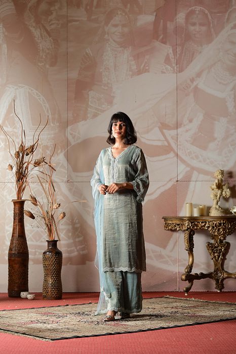 A model showcasing Powder Blue Kurta Set by Farha Syed from Farha Syed's collection