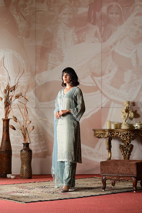 A model showcasing Powder Blue Kurta Set by Farha Syed from Farha Syed's collection