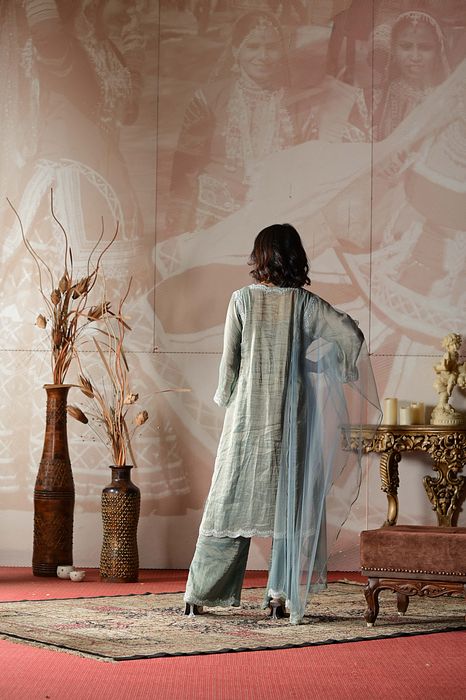 A model showcasing Powder Blue Kurta Set by Farha Syed from Farha Syed's collection