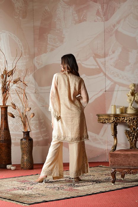 A model showcasing Ivory Beige Coord Set by Farha Syed from Farha Syed's collection